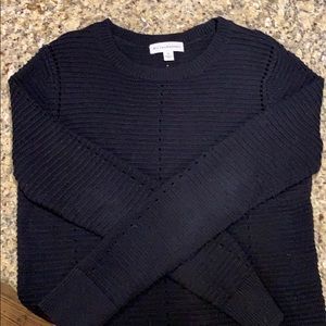 Cute black sweater with symmetrical holes